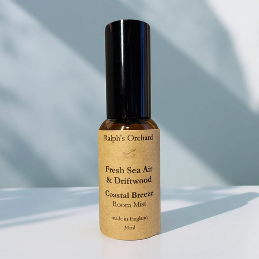 Bottle of Ralph's Orchard Fresh Sea Air & Driftwood Coastal Breeze Room Mist on a light background