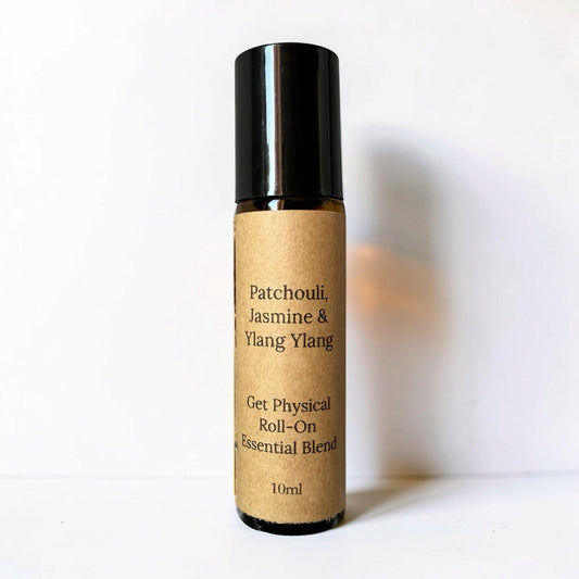 Roll-on essential oil blend bottle with kraft paper label on a white background