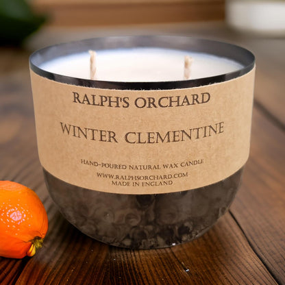 winter clementine candle with 2 wicks in dimpled black tin