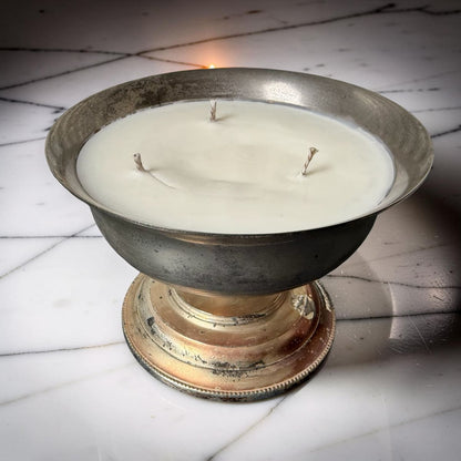 A repurposed vintage metal bowl, hand-poured with our warmly sensual Velvet Tonka fragrance and three cotton wicks.