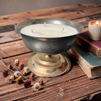 A repurposed vintage metal bowl, hand-poured with our warmly sensual Velvet Tonka fragrance and three cotton wicks.