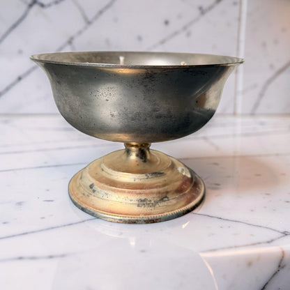 A repurposed vintage metal bowl, hand-poured with our warmly sensual Velvet Tonka fragrance and three cotton wicks.
