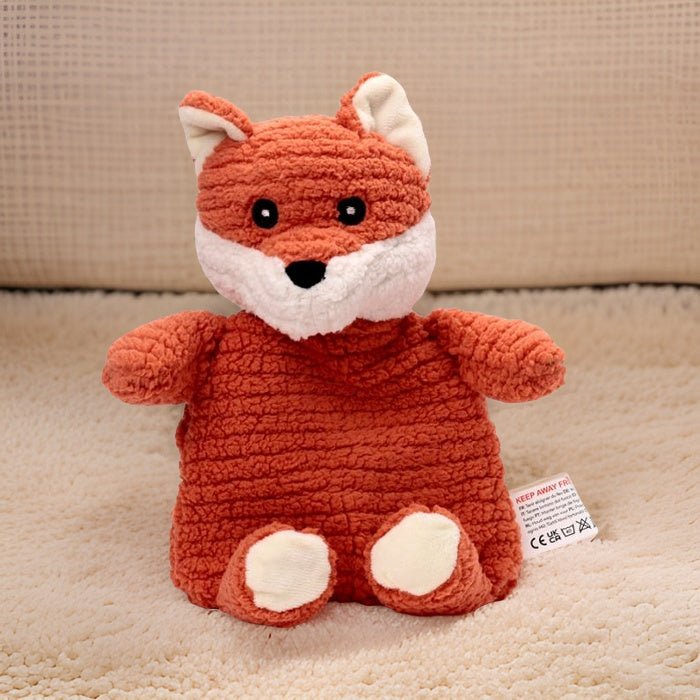 Crocheted fox plush toy on a beige carpet