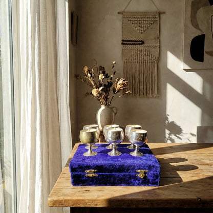 repurposed goblet candles on dining table