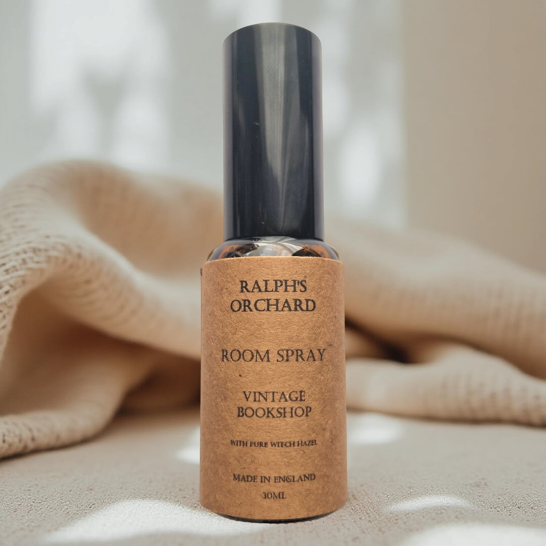 Ralph's Orchard room spray bottle on a neutral background