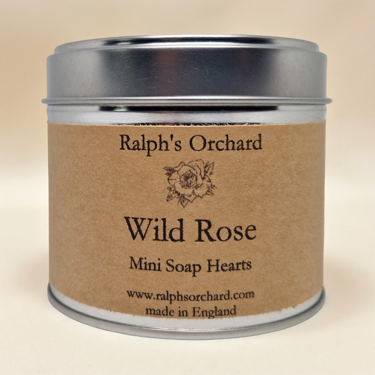 Tin of Ralph's Orchard Wild Rose Mini Soap Hearts on a beige background