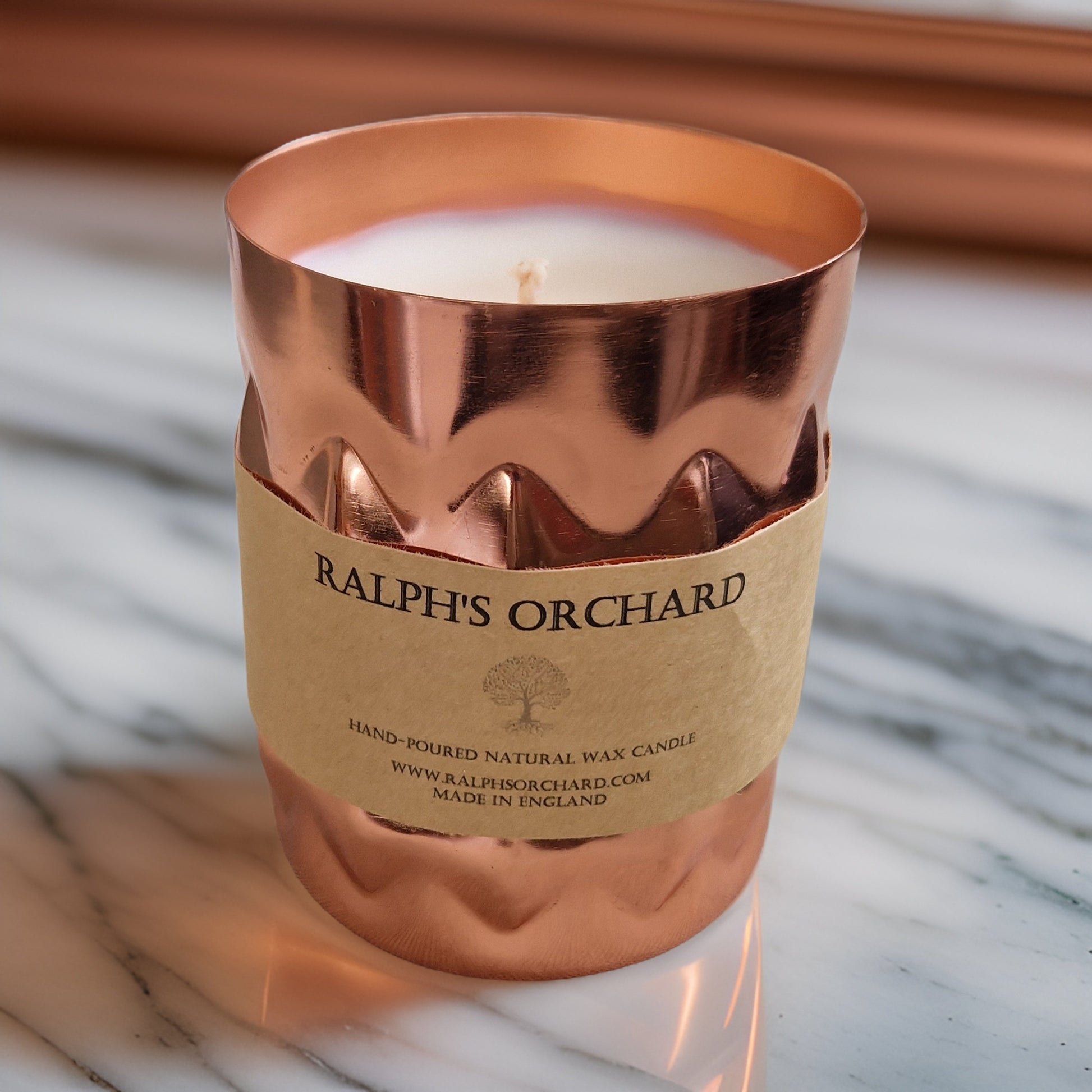 unscented candle in copper tin