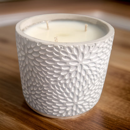 candle in cement pot