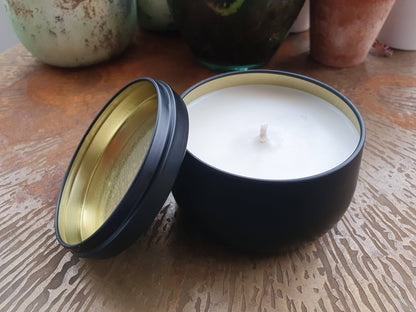 Amber & Rock Salt scenetd candle in black tin