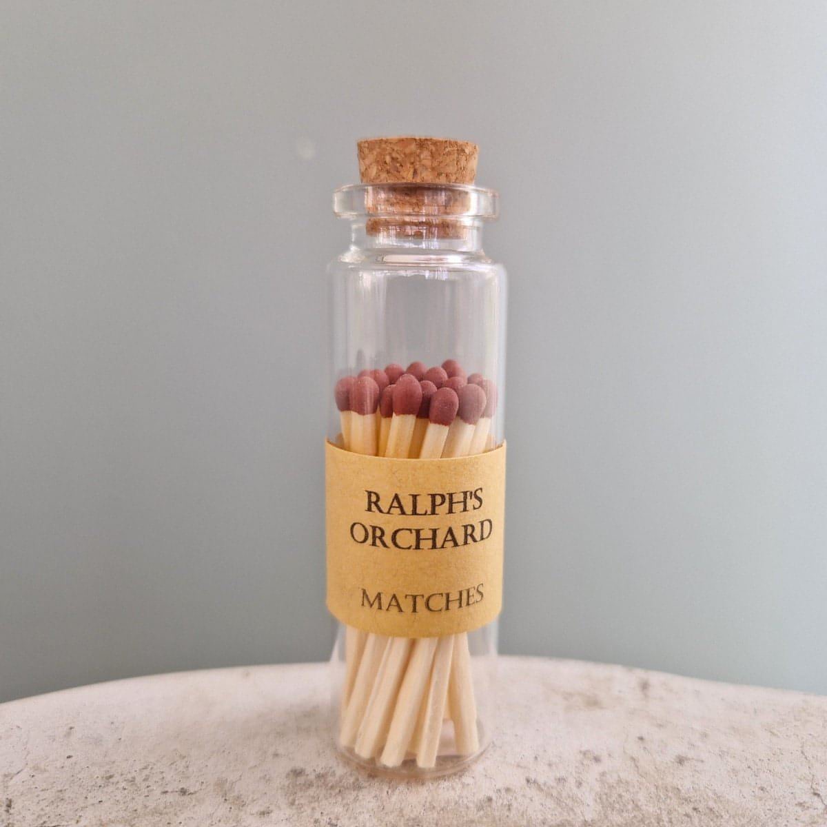 Matches in corked glass jar