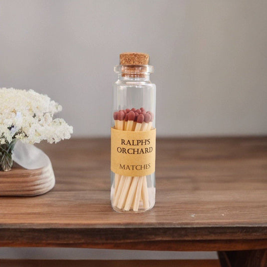 Matches in corked glass jar