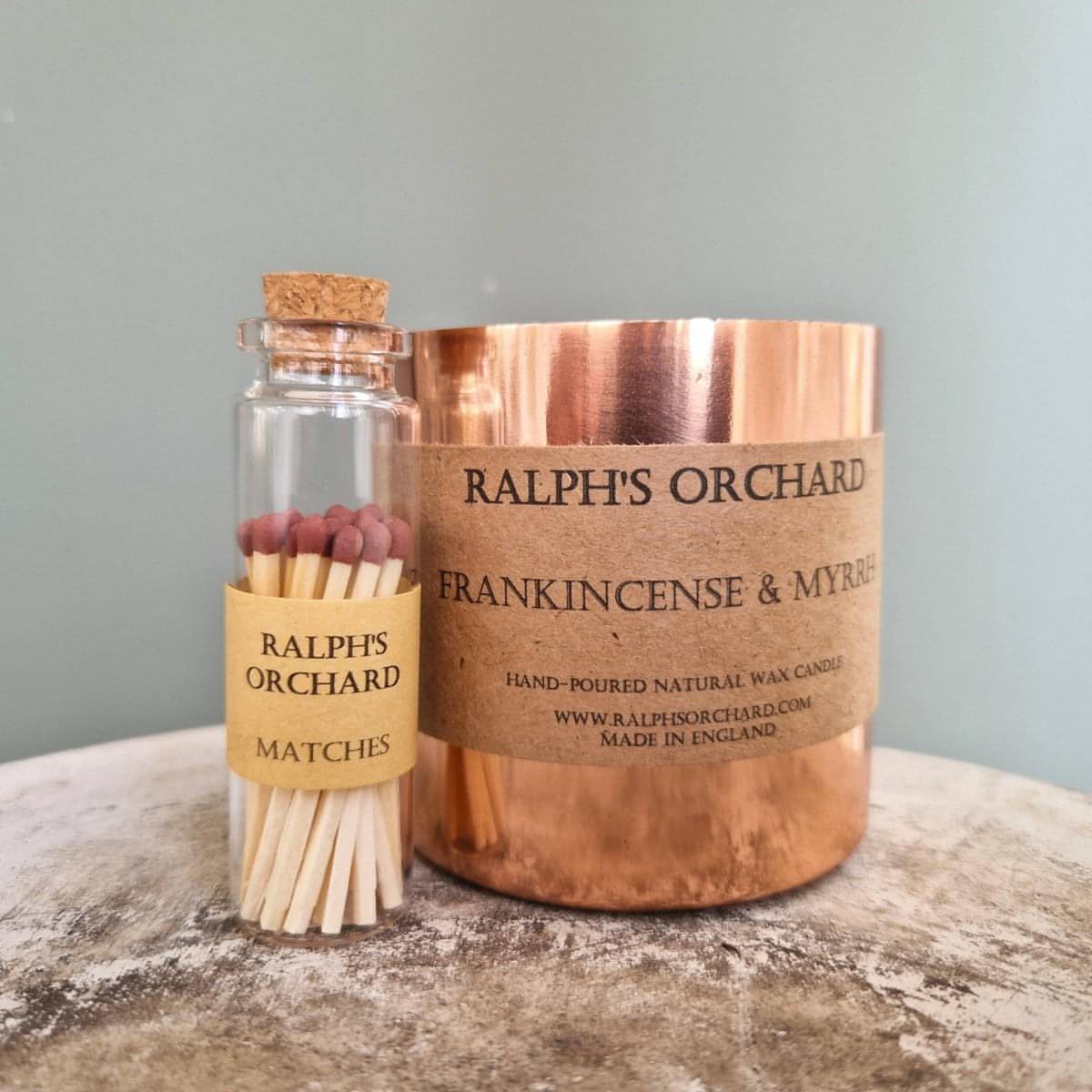 Matches in corked glass jar with copper tin candle